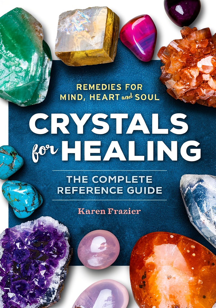 Installing Crystal Divination Kindle eBook by Althea Press 360‑Page on a wooden desk